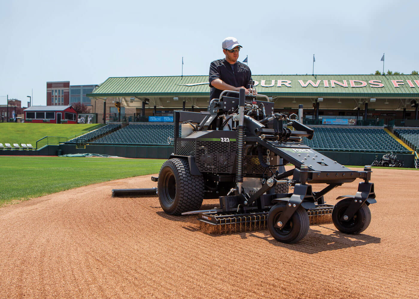 Baseball field maintenance machines